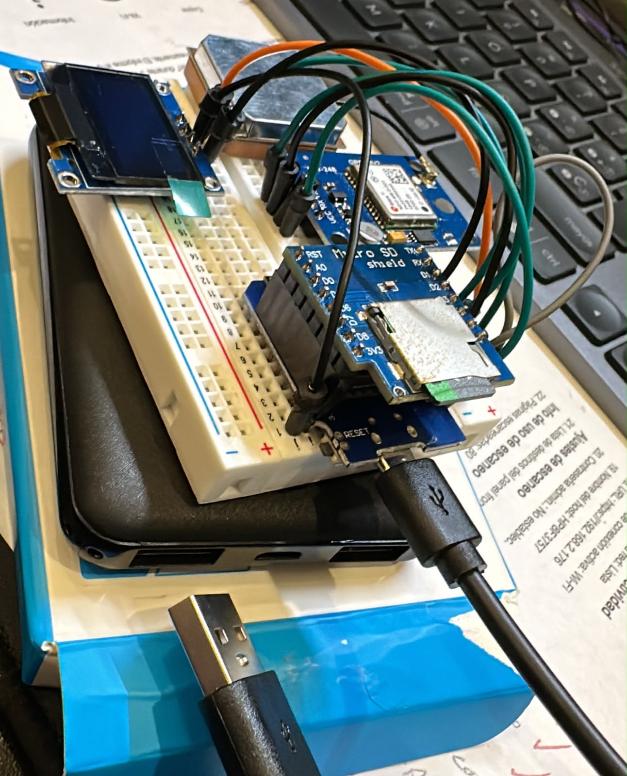 The first assembly on a breadboard, powered from a USB power bank